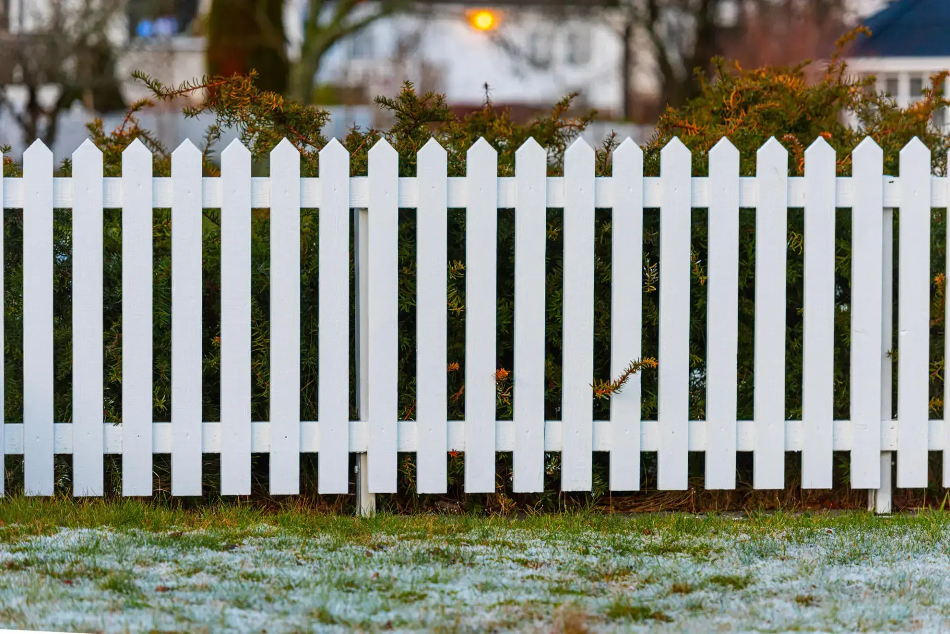 Close up view of the white picket fence installation in charleston sc