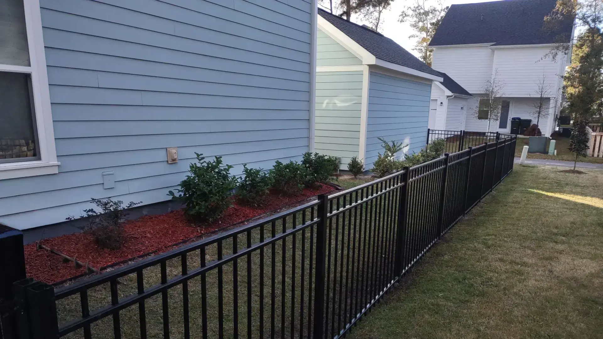 Iron fence installation on the modern house in charleston sc