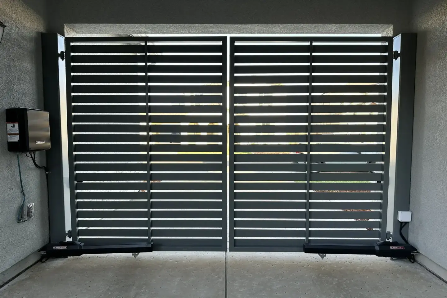 Metal automatic gate installation inside the building in charleston sc
