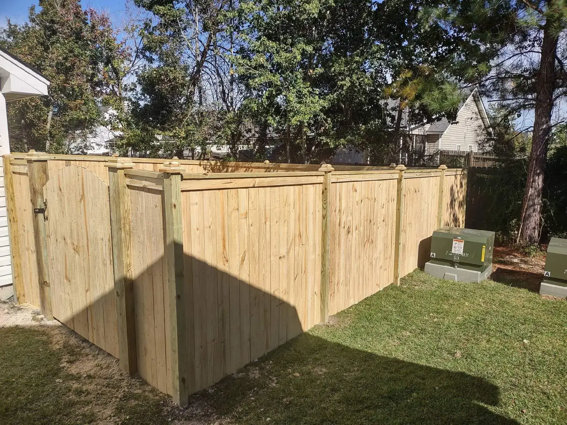 Privacy fence installation with concave gate in charleston sc