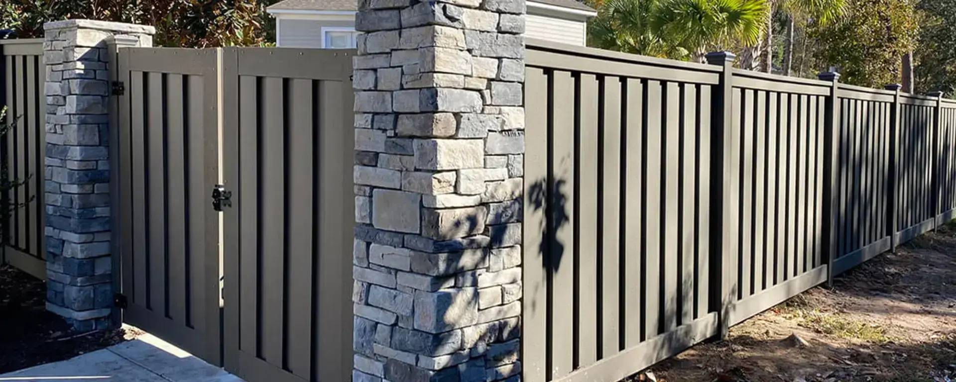 Residential drive gate installation on the brick post cap in charleston sc