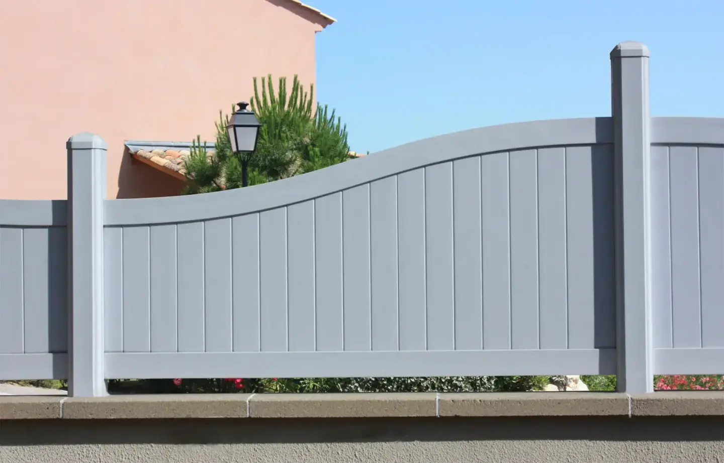 Vinyl fence panels fixed on a wall closed garden in charleston sc