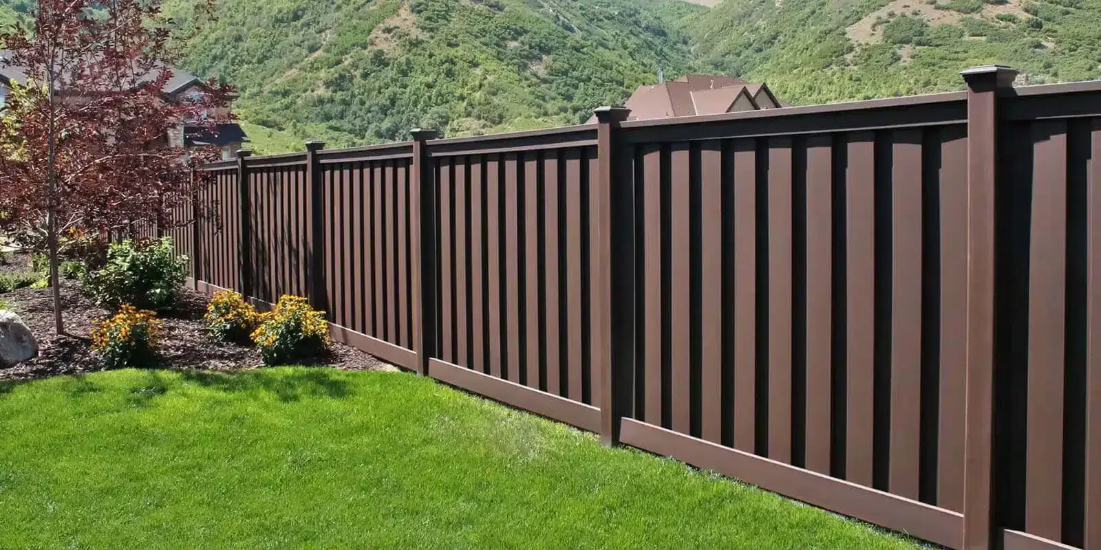 Woodland brown fence featuring mountain and trees on the background in charleston sc